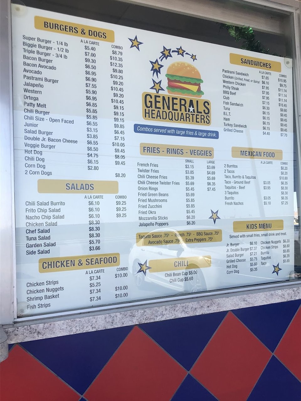 Burger meal with fries and a drink.